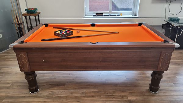 Pool table recovered just eat bright orange cloth